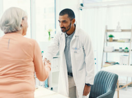 doctor-consultation-and-senior-woman-with-handsha-2025-04-06-09-50-04-utc